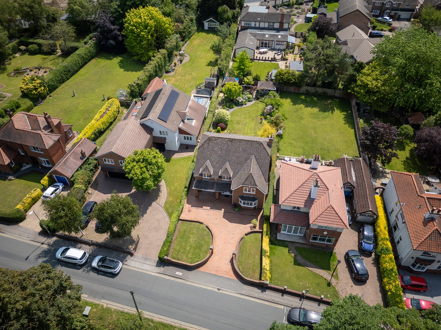 Aerial drone shot of detached house